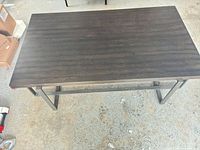 Top view showing espresso laminate surface and overall rectangular shape