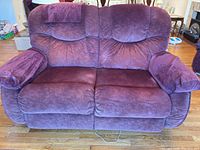 front view of burgundy microfiber reclining loveseat