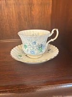 Royal Albert blue rose teacup with matching saucer