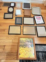 Overhead view of all fifteen frames arranged on floor