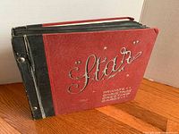 Front cover showing red textured board with Star logo and title