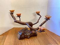 overall view of wood candle holder with five tealight candles