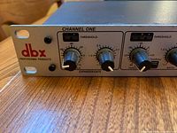 Front left of dbx 266xs showing channel one controls and logo