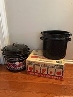 Two enamel pots, one box of mason jars
