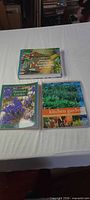 Front covers of all three gardening books on table