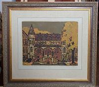 framed woodcut in ornate frame showing print and mat