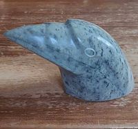Left side profile of soapstone sea bird head