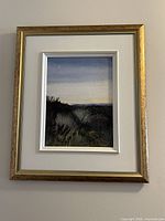 Framed painting on wall
