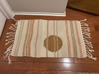 Full rug view showing overall design, fringe and size reference