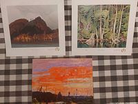 All three prints displayed on tablecloth