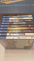 Stacked spines of all nine PS4 games