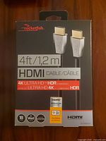 Front of Rocketfish HDMI cable box showing specs and length