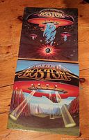 Front covers of both Boston albums