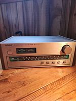 Front view of Sony ST-2950SD tuner showing dial, meters, controls