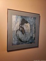 Full view of framed Picasso print on wall