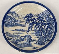 Full view of blue and white landscape plate
