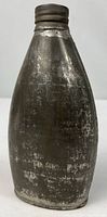 Full view of tin powder flask front