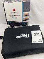 Overall lot showing Homedics box and CMF case