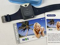 ReliefMate device on strap with manual cover visible