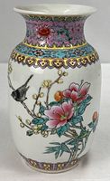 Front view of vase showing bird and floral motif