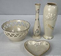 Group shot showing all four Lenox porcelain pieces