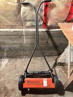 Front view showing Husqvarna branding and handle