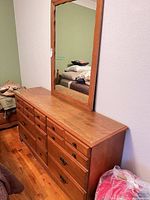 Front view dresser with attached mirror