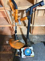 WORX trimmer, splitting maul, Laser line spool in front