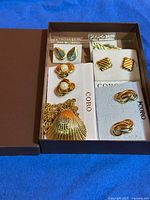 Overall view of six Coro jewelry items in presentation box