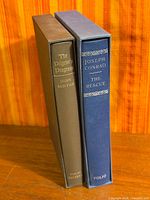 Two Folio Society hardcovers in slipcases, spines visible