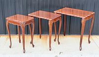 Front view of three nesting tables side-by-side