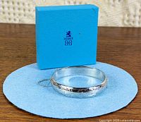 Bangle with Birks EB box