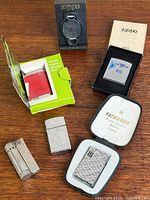 Group shot of all six lighters and packages on tabletop