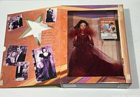 Inner display view of doll and movie poster insert