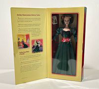 Box opened showing inner flap text and doll secured inside
