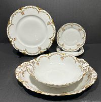 Group view of five Clover Leaf pattern pieces