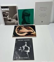 All five Henry Moore publications front covers visible