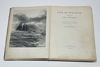 Title page with photographic plate of schooner and book title