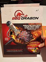 Front of retail box showing BBQ Dragon branding, product image and claims