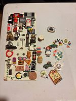 Entire display board with roughly 40 assorted magnets visible