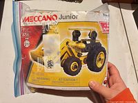 Front of resealable bag showing Meccano Junior 16103 Truck box