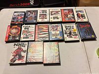 Front view of all 15 Sega Genesis games laid out showing cover art