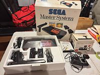 Console, accessories, retail box and styrofoam layout