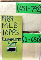 Two white storage boxes labeled 1-650 and 651-792 indicating complete set