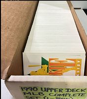 Top view of cards in long box showing uniform stack