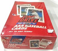 Top view of sealed 1991 Line Drive hobby box showing sample cards and wrap
