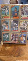 binder opened showing nine 1987 Topps baseball cards per sleeve