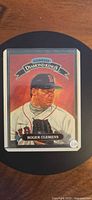 Front of 1993 Donruss Diamond Kings Roger Clemens card in sleeve and top loader