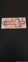 Full view of 1986 $2 Canadian bill obverse