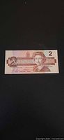 Full view of 1986 Canadian $2 banknote front side